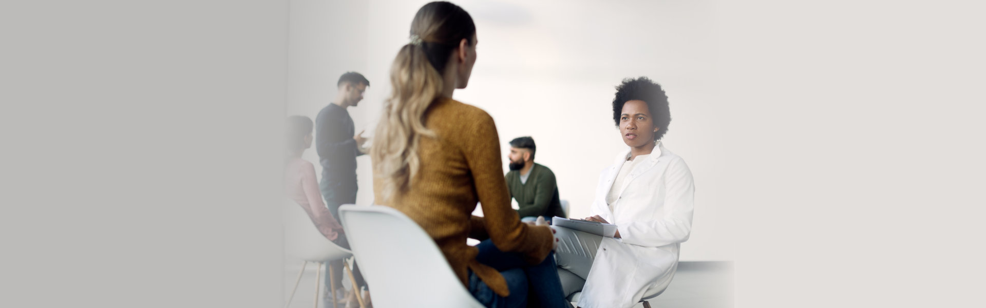therapist talking to his patient